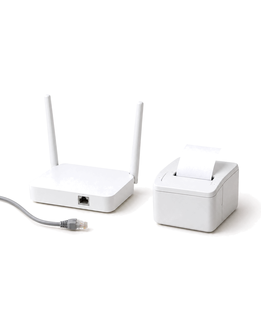 An unplugged router beside a receipt printer that keeps printing